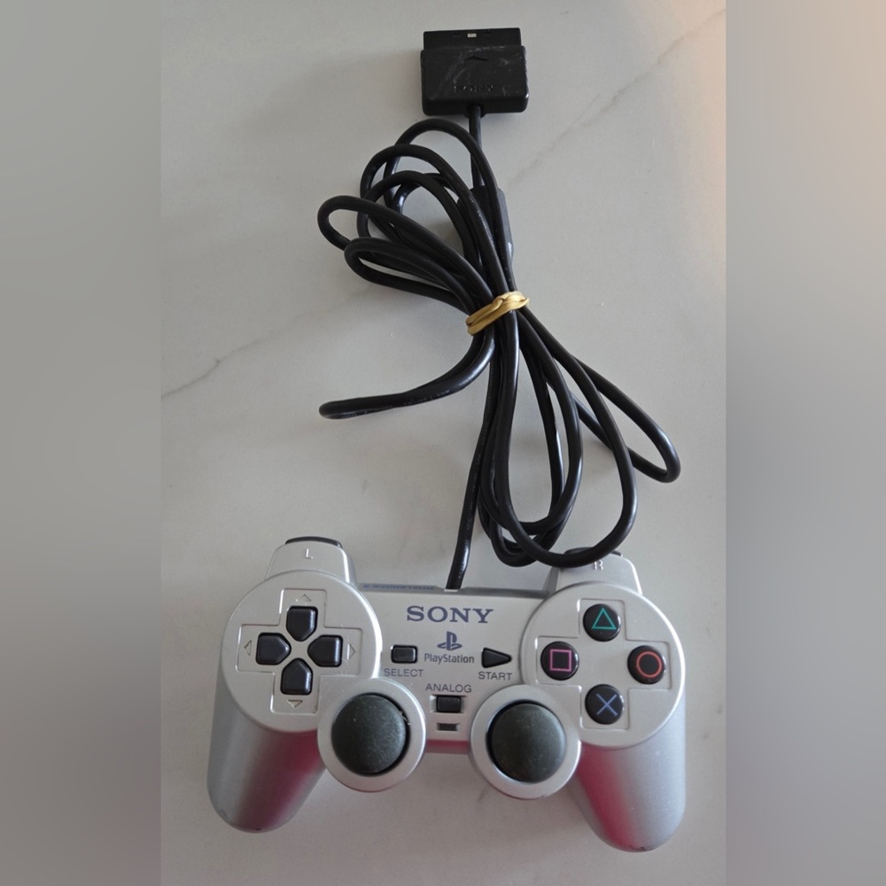 Sony PlayStation 2 Dual Shock Analog Controllers - One Sony‎ And One Unbranded